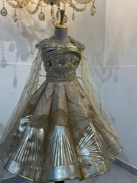 Dripping in gold metallic gown - BK Gayatri Official